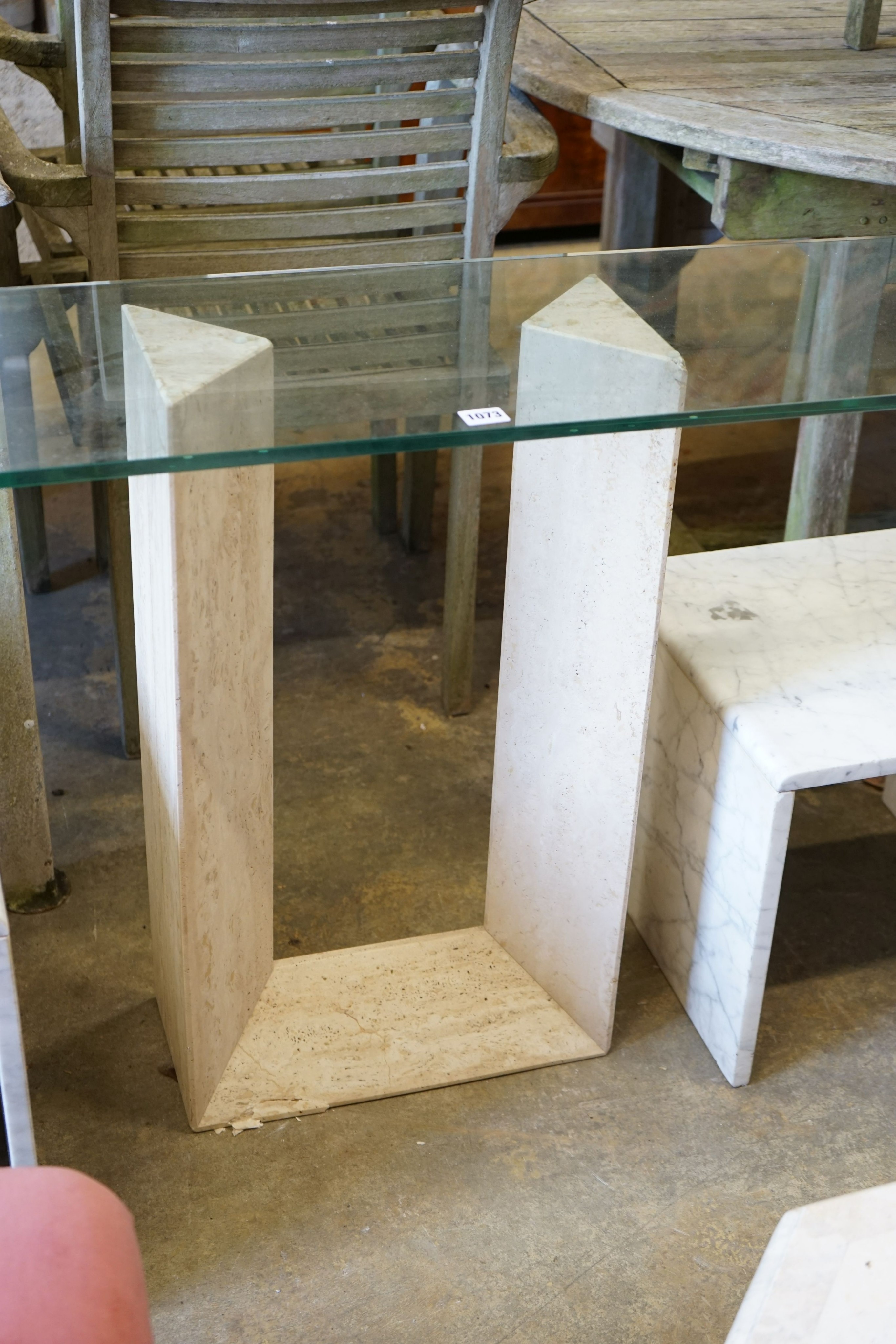 A contemporary rectangular glass topped and reconstituted marble console table, width 130cm, depth 33cm, height 72cm